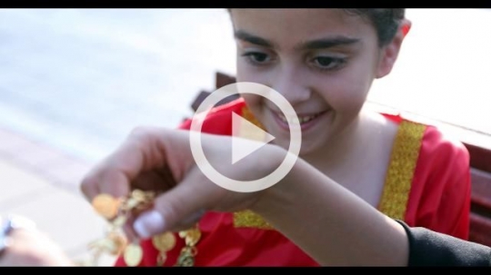 Close up of an Arab Girl proudly representing her country|