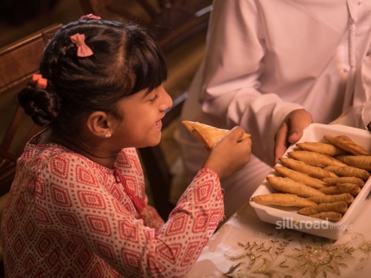 Gil eating puff pastry|-