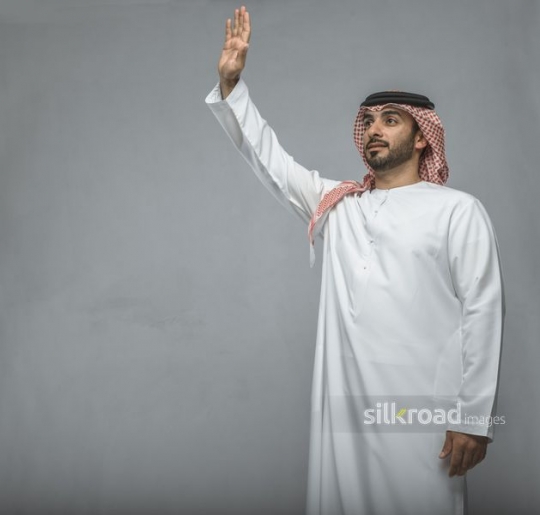 Arab Businessman waving|