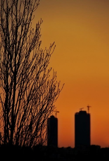 the incomplete jordan gate towers at sunset