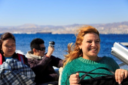 family enjoying the sea ride