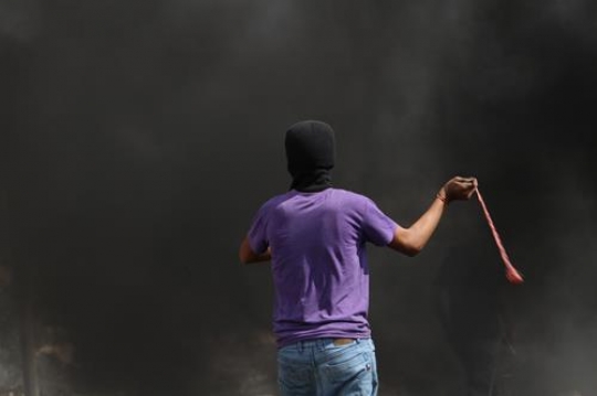 Palestinian youth fighting