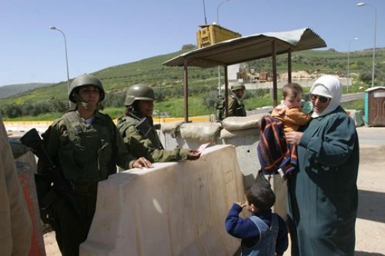 Palestinian woman at Israeli checkpoint