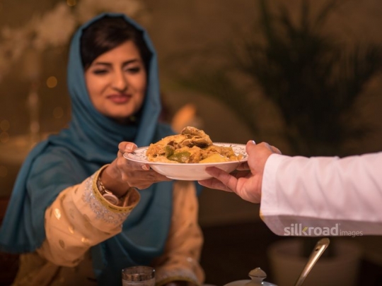 Husbnd serving wife food|-