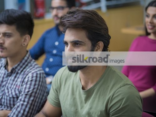 Students sitting inside the classroom|