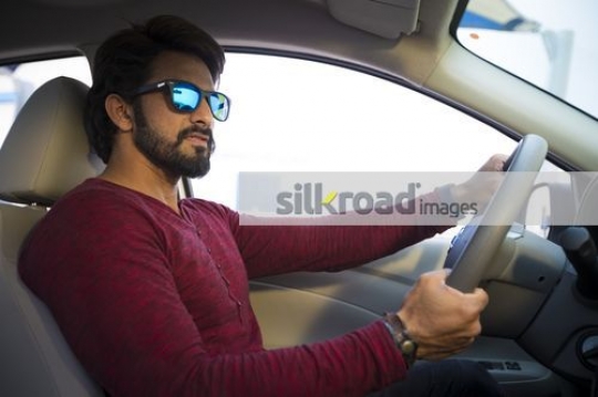 Young Expat driving |