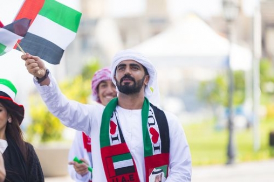 Arab man celebrating the UAE National Day|