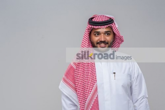 Arab Businessman dressed in a traditional attire|