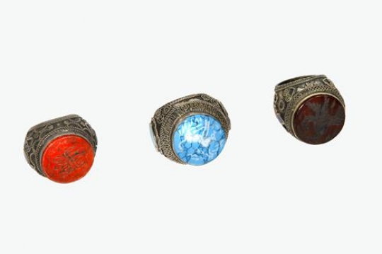 blue, orange and red old rings