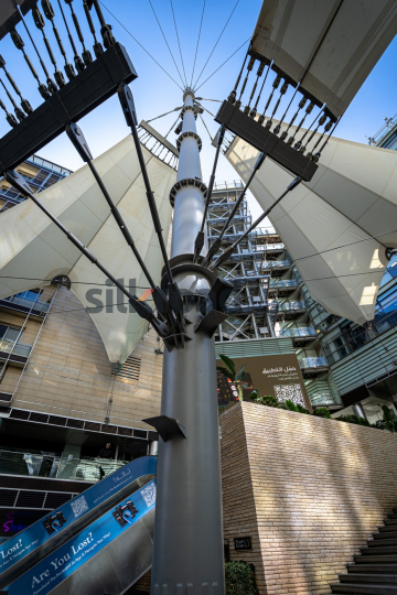 Scenic Landscape of Al Abdali Boulevard with Rotana Tower and Fountain