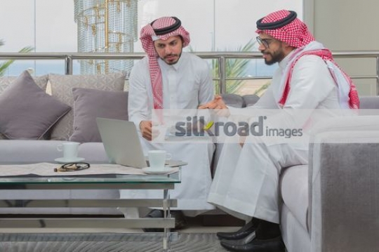 Businessmen sitting together having a meeting
