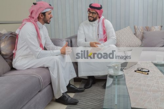 Middle Eastern Business men sitting on the couch during a meeting|
