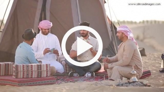 Young men playing cards
