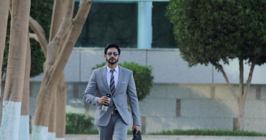 Businessman walking|-