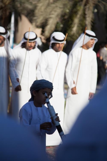 -People performing local celebration