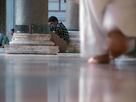 man sitting on the floor in a 