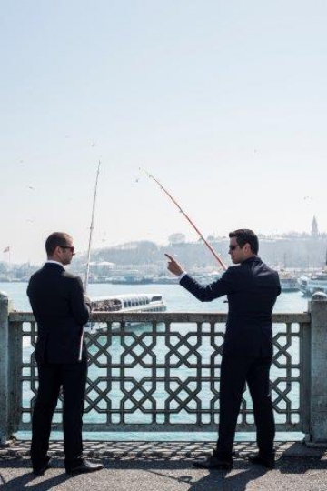 Businessmen Competing by Galata Bridge Istanbul