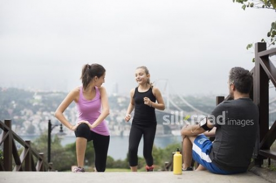 Family having rest on the stairs after sport|Spor sonrasi merdivenlerde dinlenen aile