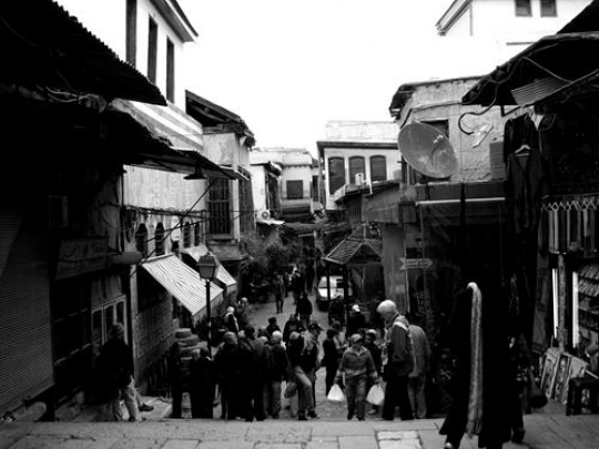 public crowd scene in black and white