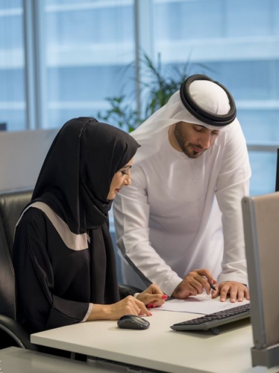 Business man and woman working together at the office|