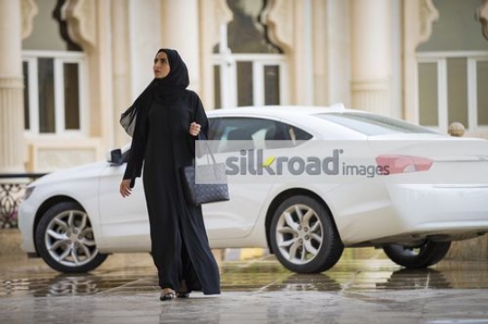 Arab employee walking to the office|