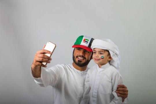 Emirati Father and Son Portrait celebrating National Day