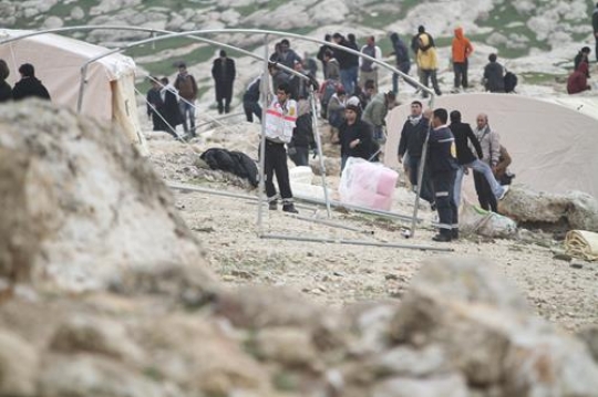 Palestinian demonstrators at Bab al-Shams or Gate of the Sun in Arabic, in a bid to draw attention to Israeli plans to boost settlement building in the West Bank area.