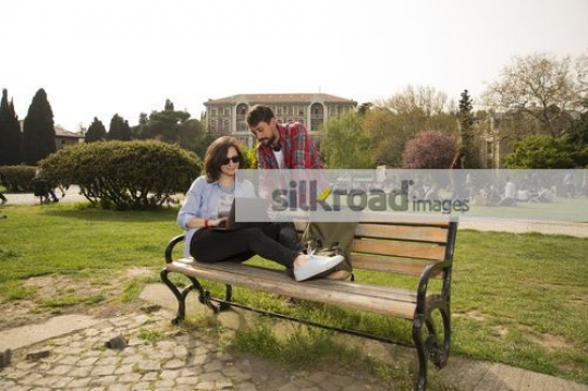 Two Students studying together on campus|