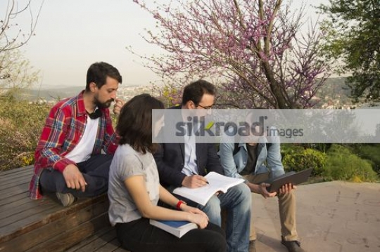 Professor talking to the University Students |