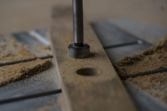 Cut a circle through the wood
