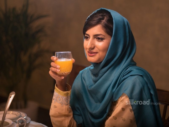 Mother drinking juice|-