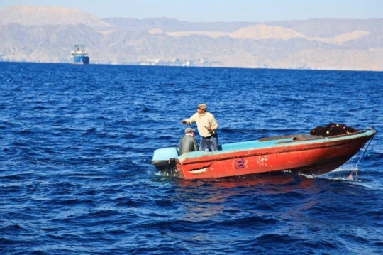 men in a fishing boat