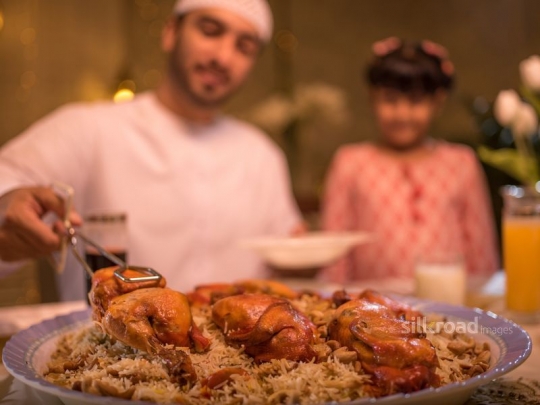 Father serving food|-