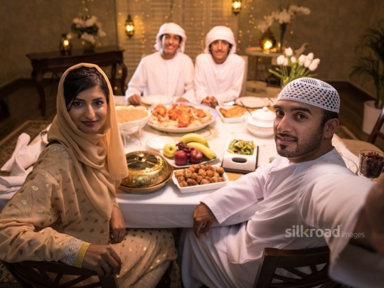 Family taking selfie around iftar|-
