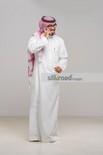Middle Eastern Businessman having a phone call|
