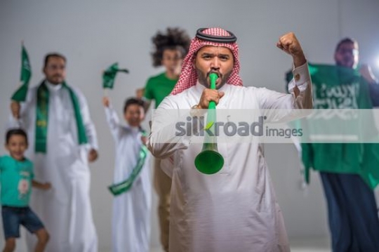 Arab group of friends and family celebrating|