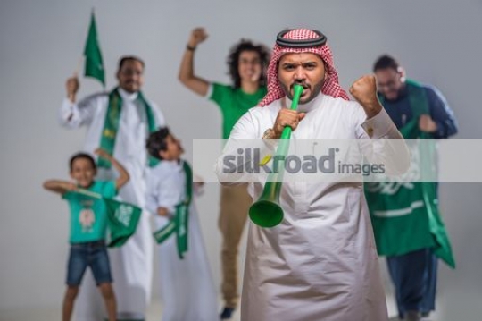 Middle Eastern group of friends and family celebrating|