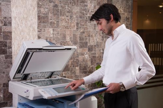 businessman working with printer in the office