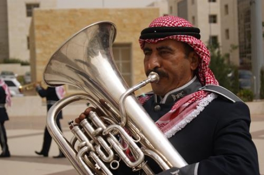 military musician plays during jordanian celebration