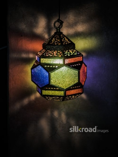 Colourful lantern on the wall|-