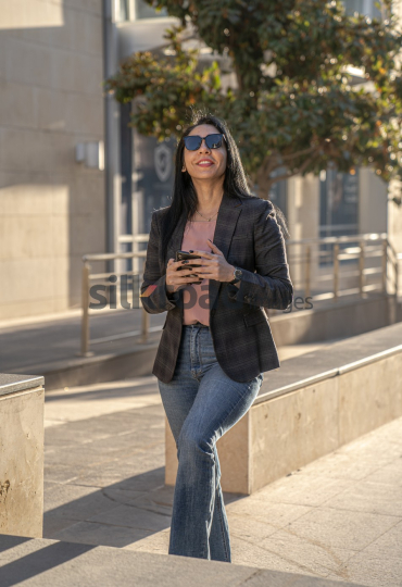 Professional Woman Enjoying Morning Coffee in Al Abdali Boulevard